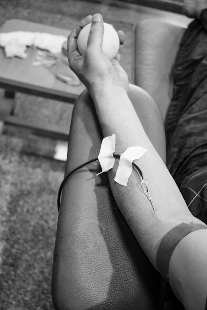 Man Donating Blood in Hospital